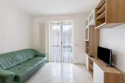 Image de Appartement 'M&M House Beach - 4 Salti Dal Mare' avec vue montagne, Wi-Fi et climatisation