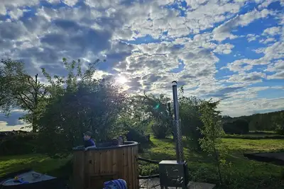Image de Grande maison pour la famille avec hottub, grande jardin et salle de jeux