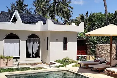 Image de Standalone Luxurious 2 Bedroom villa  — 5 min from the beach!