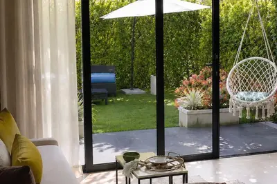 Image de Casa Nova Retreat • Private Patio • Artificial Beach• Pools • 15 Min to Airport•