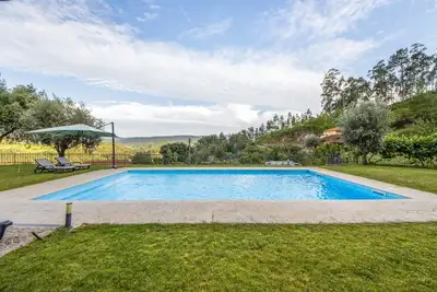 Image de Casa De Pedra D'alborinhas – Maison en pierre du XIXe siècle avec piscine et 3 suites