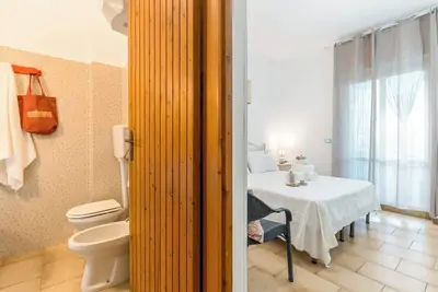 Image de 24 \"Il Porticciolo Vacanze\" Studio Apartment with a Veranda Overlooking the Garden 24