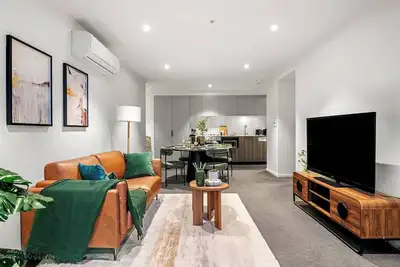 Image de Appartement à 2 lits Dockslands, confortable et adapté aux familles, piscine, salle de sport, parking gratuit