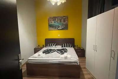 Image de 2-bedroom apartment in perfect București with refreshing Ac up to 9 Guest