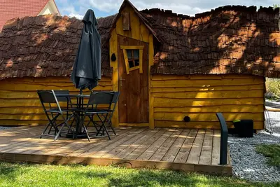 Image de Cabane enchantée avec piscine-spa
