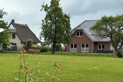 Image de 5-bedroom vacation home in Mellnitz on Rügen, nestled in the heart of a natural paradise
