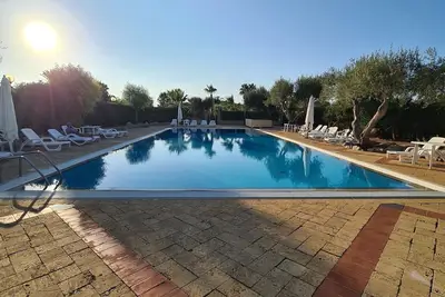 Image de Villa Three Cocus in a tourist village, surrounded by greenery and near the sea