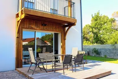 Image de Maison neuve climatisée, tout confort, idéale pour familles et entre amis.