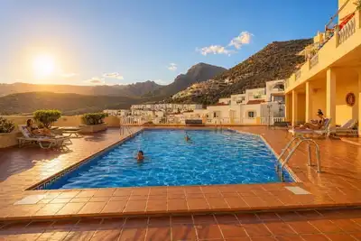 Image de Bright 1-Bedroom Apartment with Private Terrace and Views | Pool