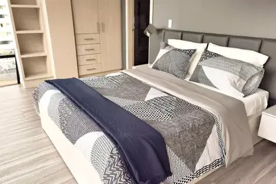 Image de Luxury Apartment in Quito. La Carolina Mall el Jardín (parking lot)