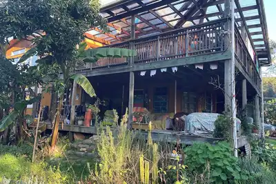 Image de Tree House Marahau a sanctuary in a lush valley bordering the Abel Tasman Np.