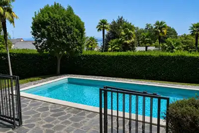 Image de Acquazzurra, luxury duplex, pool, parking space, free WiFi, By Guestaly