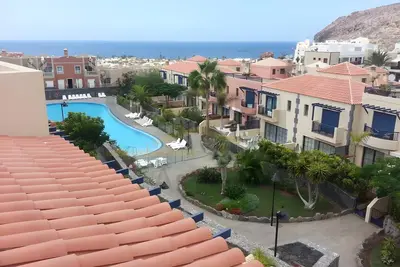 Image de Maison de vacances « Palm Mar, Club De Mar » avec vue mer, piscine commune et Wi-Fi