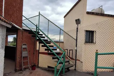 Image de Amazing studio with a magnificent view of the city & private roof garden in Qro