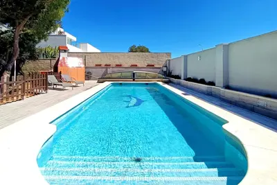 Image de Appartement « Villa avec piscine et barbecue La Manga » avec vue mer, Wi-Fi et climatisation