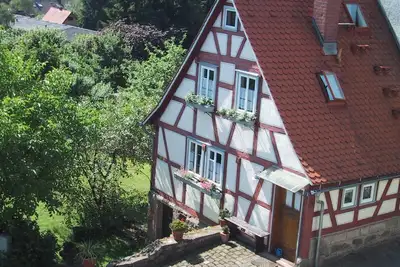 Image de Odenwald cottage, a half-timbered day laborer's house, historic atmosphere.