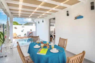 Image de Bungalow Ama – 2 Chambres | Piscine & Plage à 20 m