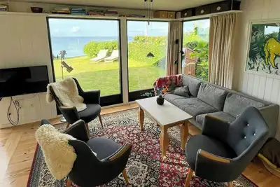 Image de Charmante petite maison de vacances au bord de l'eau