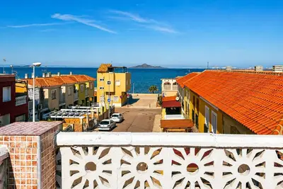 Image de Maison au Mar Menor avec vue sur la mer et terrasse.