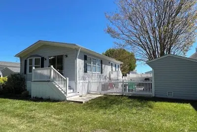 Image de Assateague Pointe- single home on a quite pond. 2 pools/pier/game room.