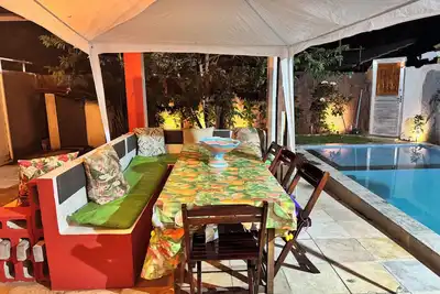 Image de Beach house in Alemão offering comfort near the sea. House with pool, near the sea.