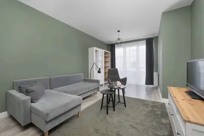 Image de Cozy Apartment with a Balcony, Near Parks and the Partynice Racetrack by Noclegi Renters