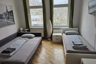 Image de L Bright apartment in the city center with an elevator