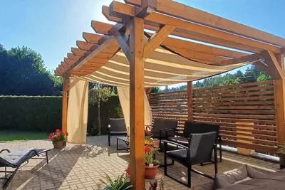 Image de Appartement de vacances avec jacuzzi et Wlan