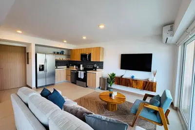 Image de Experience comfort and convenience at Live Apartment Jacó. Featuring modern interiors, thoughtful amenities, and a prime location near the beach and vibrant local hotspots, this apartment is perfect for couples, families, and travelers seeking an enj