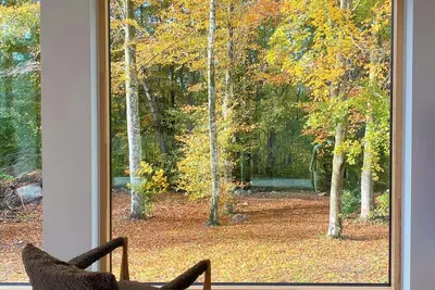Image de Maison en bois de cèdre sur un terrain boisé de 3 000 m² à Mariager