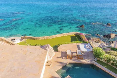 Image de Striking Modern Villa Above a Rare Swimmable Cove — Chef & Butler Included