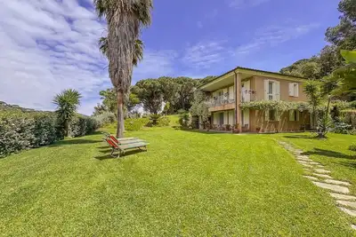Image de Suite with sea view and private woodland