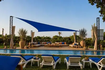 Image de Domaine Palm Oasis | 2 Villas 16 pers•Piscine 25m Casablanca Homecity Signature