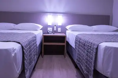 Image de Standard Twin Bed Room | Pet-Friendly | 0. 5 Mi from Igreja Matriz Tower