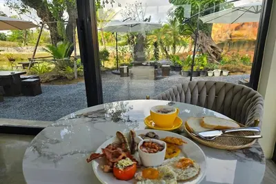 Image de Bungalow paisible avec vue sur la piscine à Chiang Rai