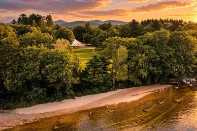 Image de Secluded Group Retreat with Hot Tub, Riverfront & Huge Yard in Conway, New Hampshire