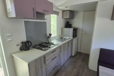 Image de De Kleine Bosparel | Cozy chalet near a recreational lake and forest.