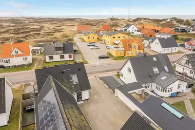 Image de Renovated holiday home with enclosed terrace, centrally located in Vorupør