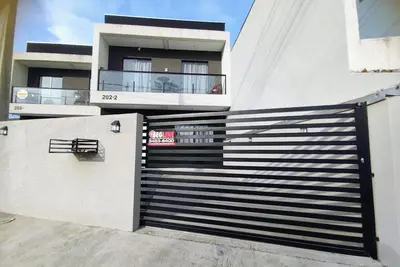 Image de New townhouse, near the sea, with air conditioning and close to the center of Matinhos.