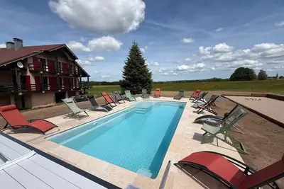 Image de Chalet Le Repère des Générations, piscine chauffée, sauna et jacuzzi