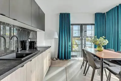 Image de Dwie Motławy 31 with Loggia | River View