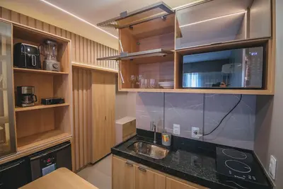 Image de Luxury studio apartment 3 minutes from the natural pools.
