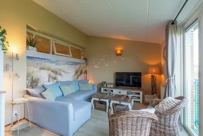 Image de A beautifully and modernly furnished apartment, located right at the foot of the dunes.
