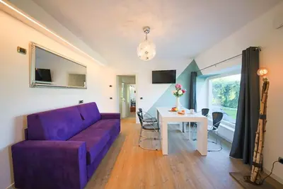Image de Appartement 'Casa Mike' avec vue sur le lac, jardin privé et Wi-Fi