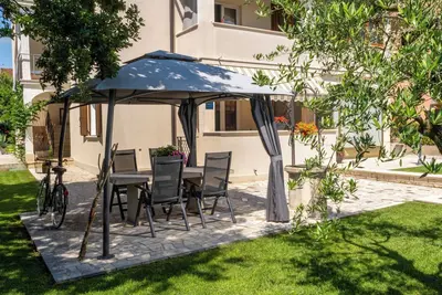 Image de Apartment for 4 guests with garden seating area, near Pical beach