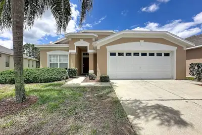 Image de Whispering Palms - Luxury 4-Bedroom Pool Home Near Disney World