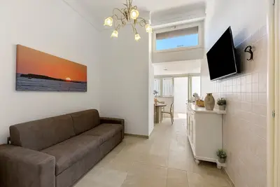 Image de Appartement 'L'Aurora B&B - Suite Tramonto' avec terrasse partagée, Wi-Fi et climatisation