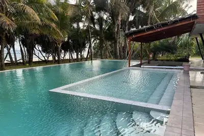 Image de Zanatany Beach Hôtel, \"Chambre Confort\" bord de mer avec piscine à débordement