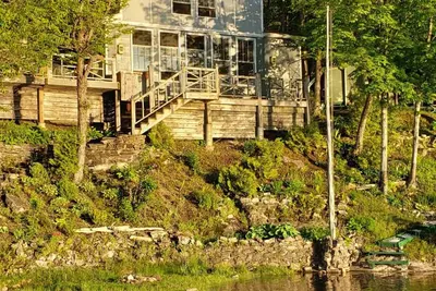Image de Vintage, boho, waterfront Cottage with dock access!