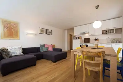 Image de Modern apartment in a quiet location. With an underground parking garage, ski storage, and bike storage.